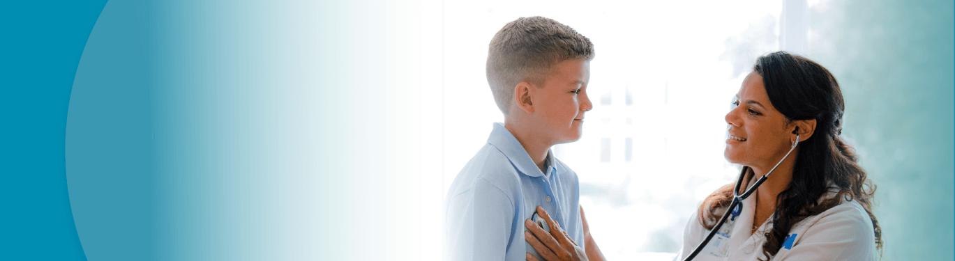 Kelsey-Seybold doctor checking young patient