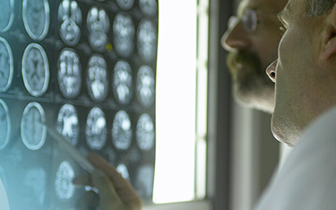 Kelsey-Seybold nuclear medicine specialists review a patient's scans.