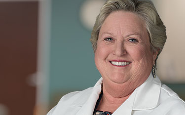Portrait of Christy Knowles, PNP-PC, Pediatrics specialist at Kelsey-Seybold Clinic.