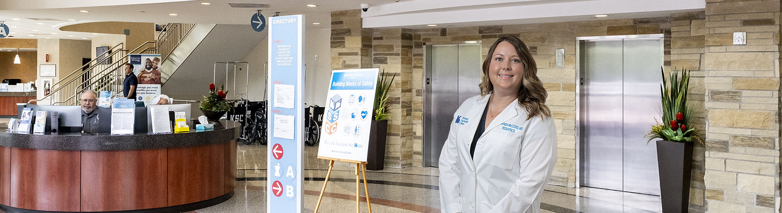 Pediatrician Amanda McCord stands in the lobby of Kelsey-Seybold's The Vintage Clinic.