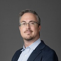 Headshot of Mark Walsh, PharmD.