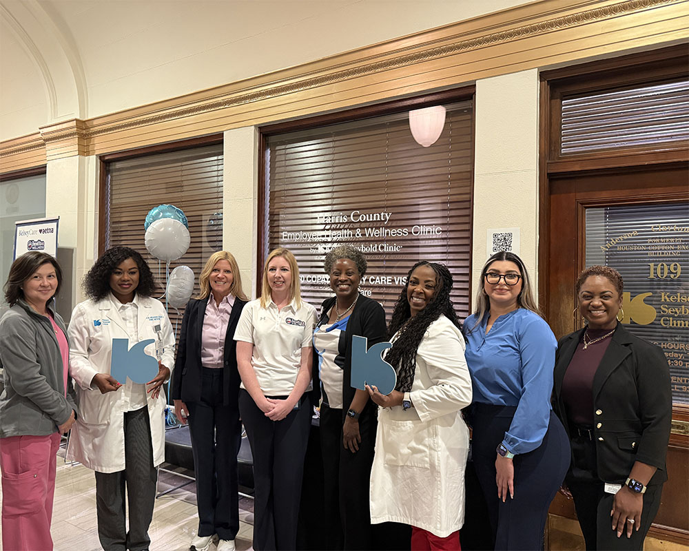 Kelsey-Seybold leadership and clinic staff pose with Harris County staff.