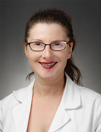Headshot of Marianna Karpinos, MD, neurologist at Kelsey-Seybold Clinic.