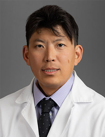Portrait of Hyunmo Koo, MD, Family Medicine specialist at Kelsey-Seybold Clinic.