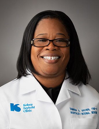 Portrait of Tamikiia Brown, MSN, APRN, FNP-C, LNC, Hospitalist specialist at Kelsey-Seybold Clinic.