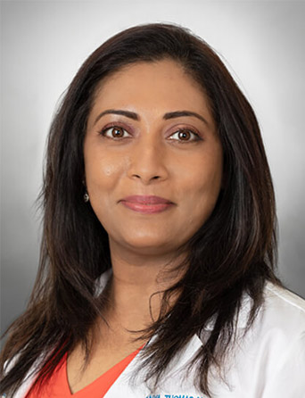 Portrait of Dhanya Thomas, MS, RN, AGACNP-BC, Pulmonary Medicine specialist at Kelsey-Seybold Clinic.