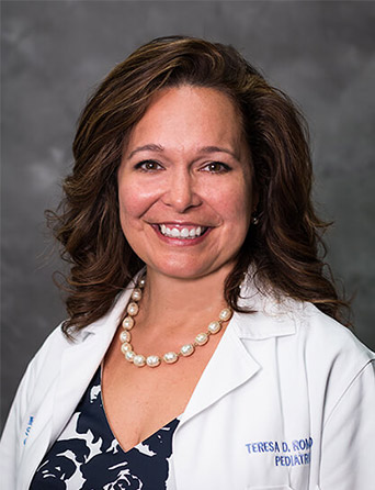 Portrait of Teresa Romero, MD, Pediatrics specialist at Kelsey-Seybold Clinic.