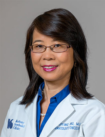Portrait of Guiying Hu, MD, Hematology/Oncology specialist at Kelsey-Seybold Clinic.