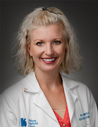 Portrait of Holli Smith, MD, FACOG, Gynecology and OB/GYN specialist at Kelsey-Seybold Clinic.