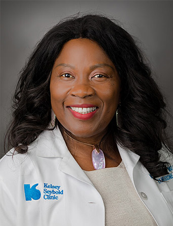 Portrait of Molly Nakyonyi-Ntwatwa, MD, FAAFP, Family Medicine specialist at Kelsey-Seybold Clinic.