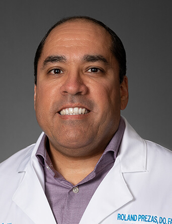 Portrait of Roland Prezas, DO, FAAFP, Family Medicine specialist at Kelsey-Seybold Clinic.