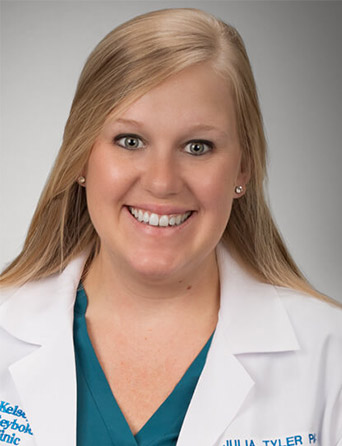 Headshot of Julia Tyler, orthopedic physician assistant at Kelsey-Seybold Clinic.