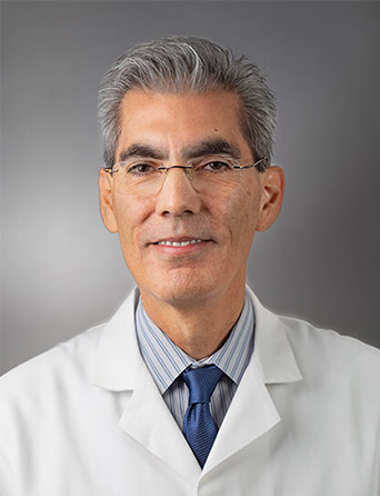 Headshot of Xavier Castillo, occupational and internal medicine specialist at Kelsey-Seybold Clinic.
