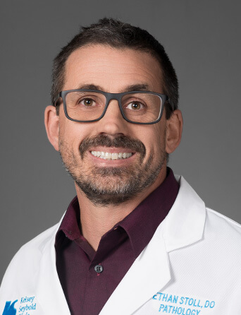 Portrait of Ethan M. Stoll, DO, MS, pathologist at Kelsey-Seybold Clinic.