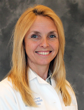 Headshot of Lisa Hauser, MD, executive health specialist at Kelsey-Seybold Clinic.