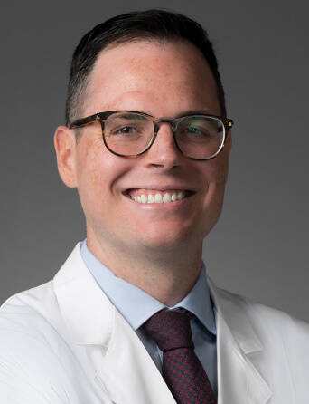 Portrait of Tyler Young, MD, OB/GYN specialist at Kelsey-Seybold Clinic.