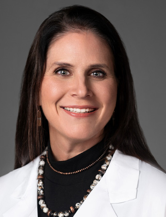 Portrait of Nicole Ches, PA-C,  specialist at Kelsey-Seybold Clinic.