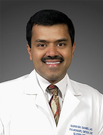 Headshot of Suresh Daniel, MD, FCCP, ABSM, sleep and pulmonary medicine specialist at Kelsey-Seybold Clinic.