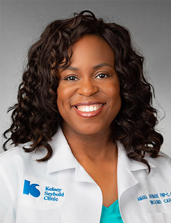 Headshot of Amaka Akinade, FNP-C, CWOCN, Wound Care specialist and Plastic surgeon at Kelsey-Seybold Clinic.