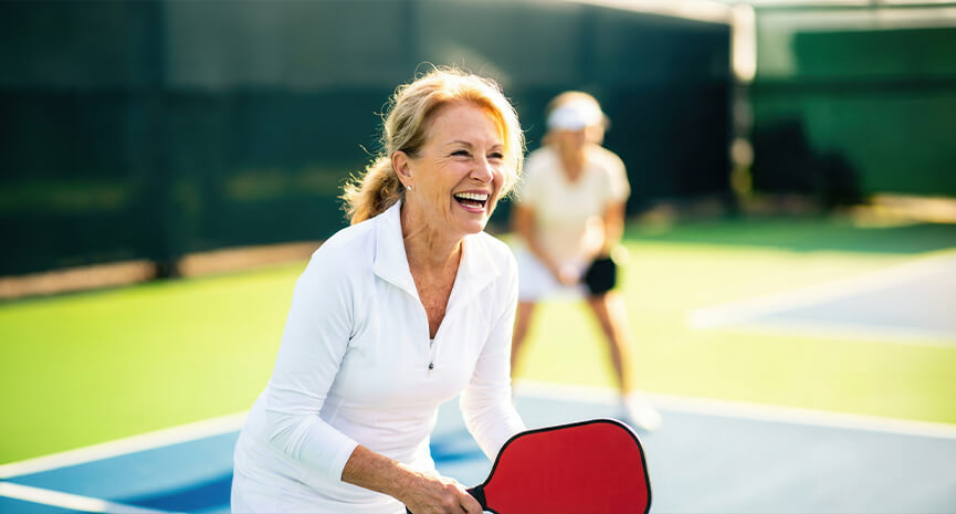 Women playing pickleball
