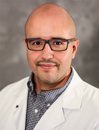 Portrait of Oscar Longoria, MD, Radiology specialist at Kelsey-Seybold Clinic.