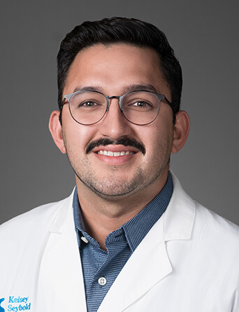 Portrait of Marco Jauregui, MD, OB/GYN specialist at Kelsey-Seybold Clinic.