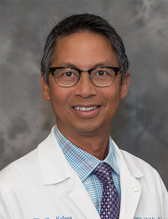 Portrait of Tuyen Tran, MD, Hospitalist specialist at Kelsey-Seybold Clinic.